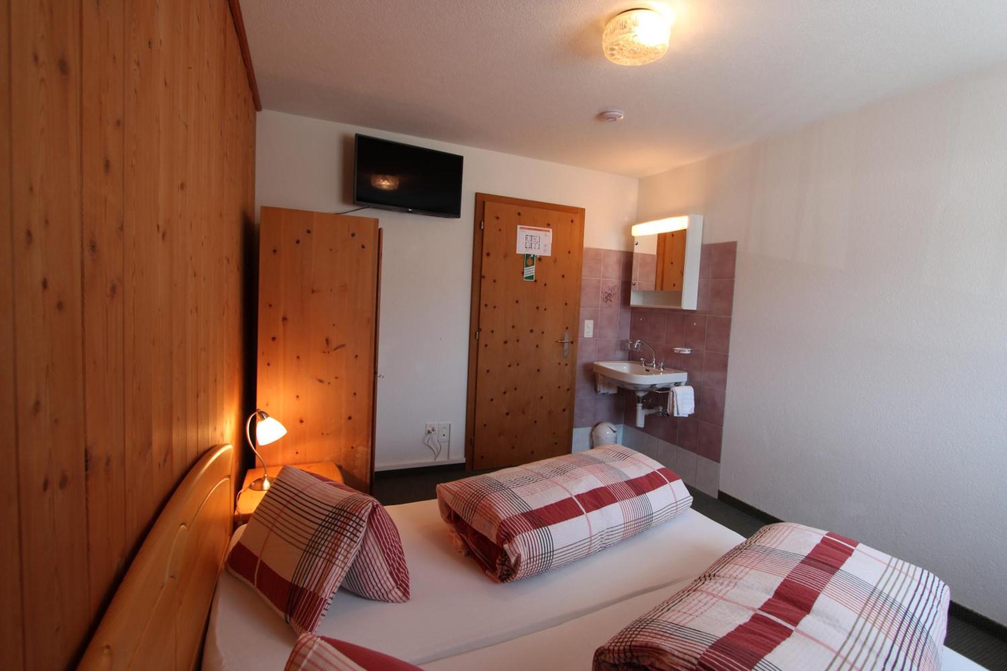 Hotel Al Rom Tschierv Camera foto